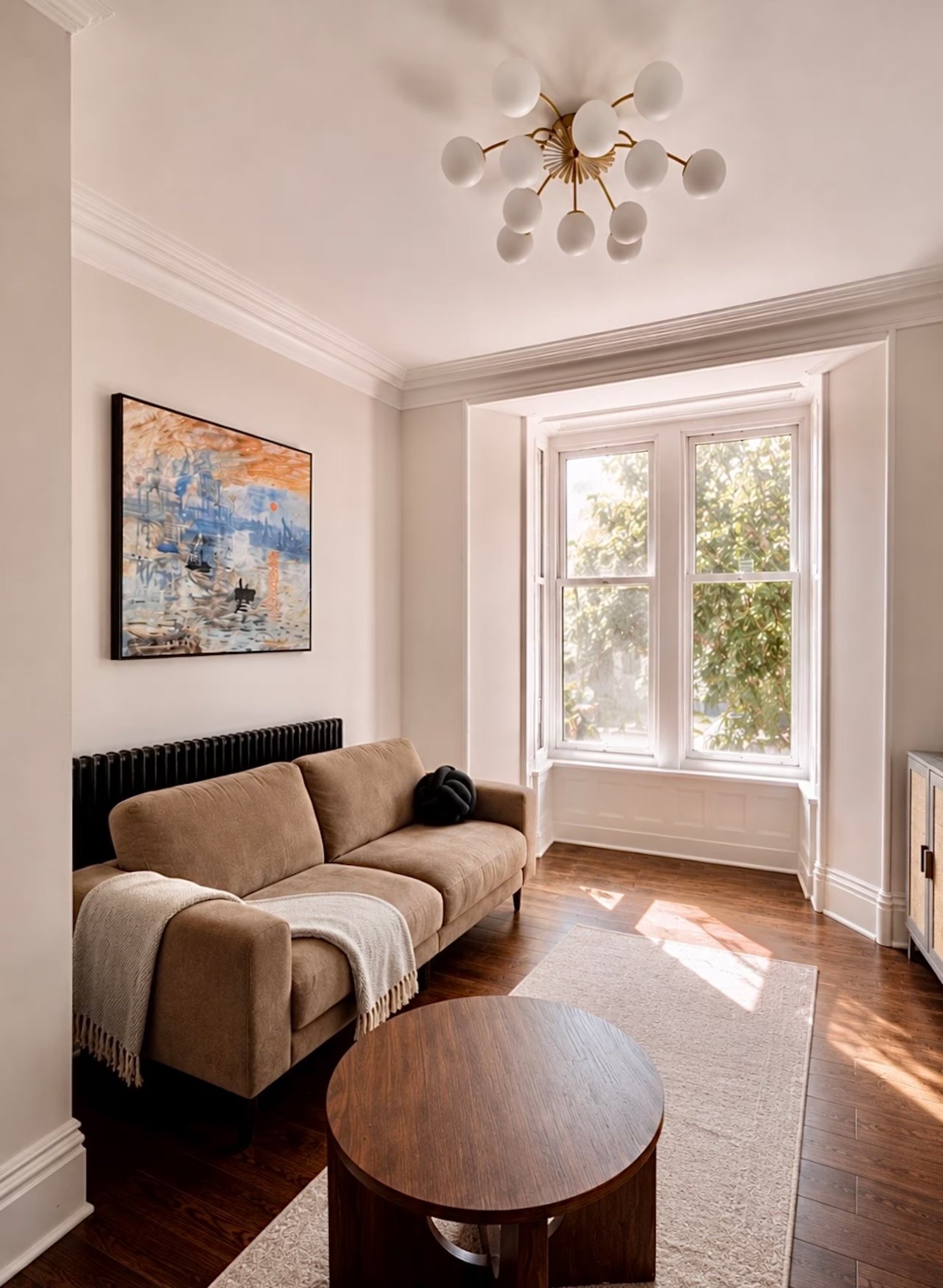 The living room, with its bay window.