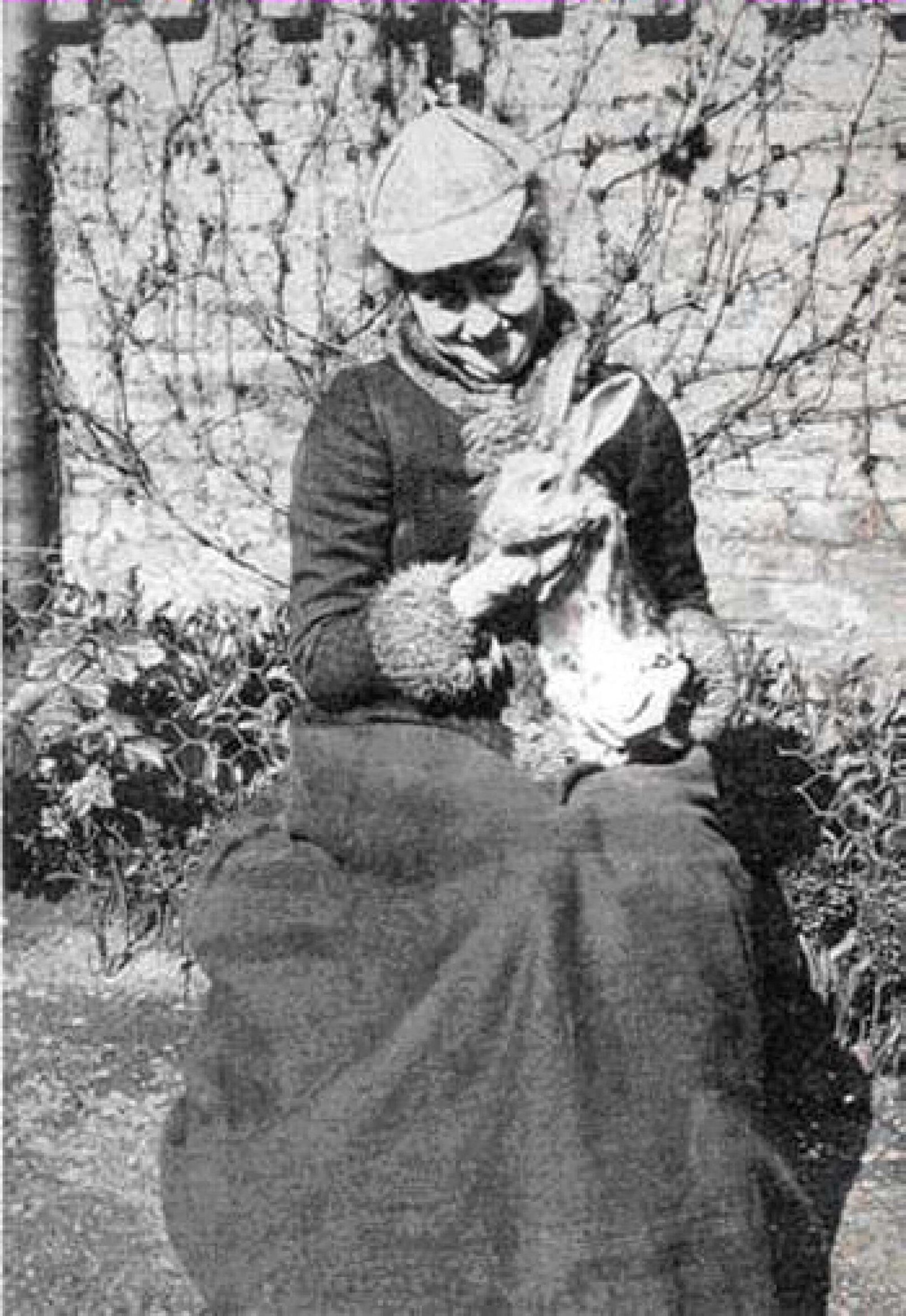 Beatrix Potter with a rabbit, late 1800s.